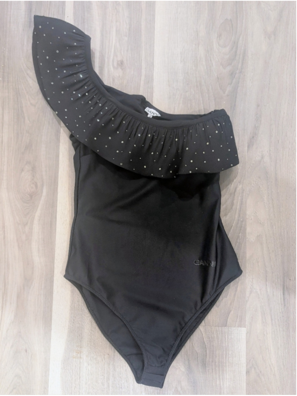 GANNI | Ruffled Rhinestone One-Shoulder Bodysuit In Black - Picture 3 of 11